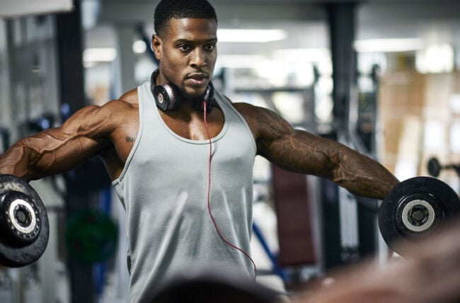 person Lifting Weights at Gym 588683021 770x533 1