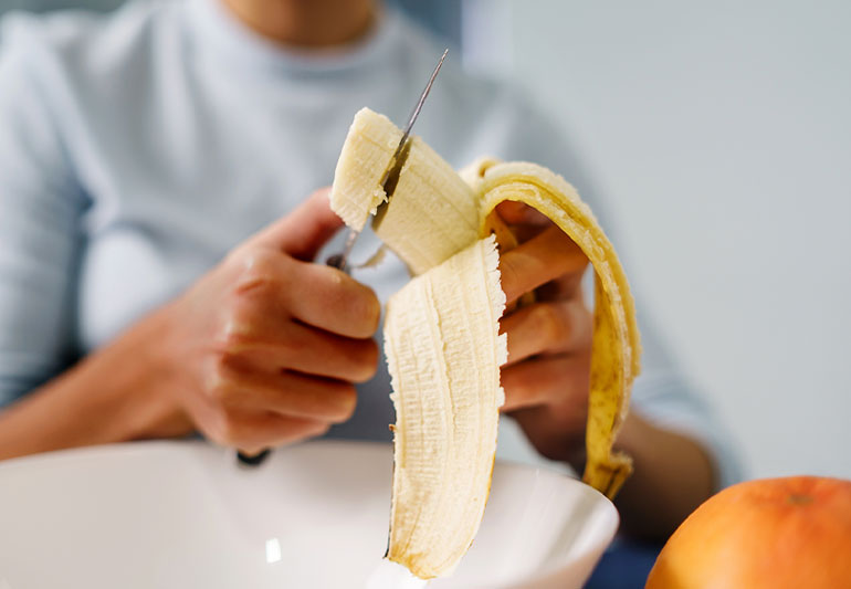 person Cut Banana 1292662472 770x533 1