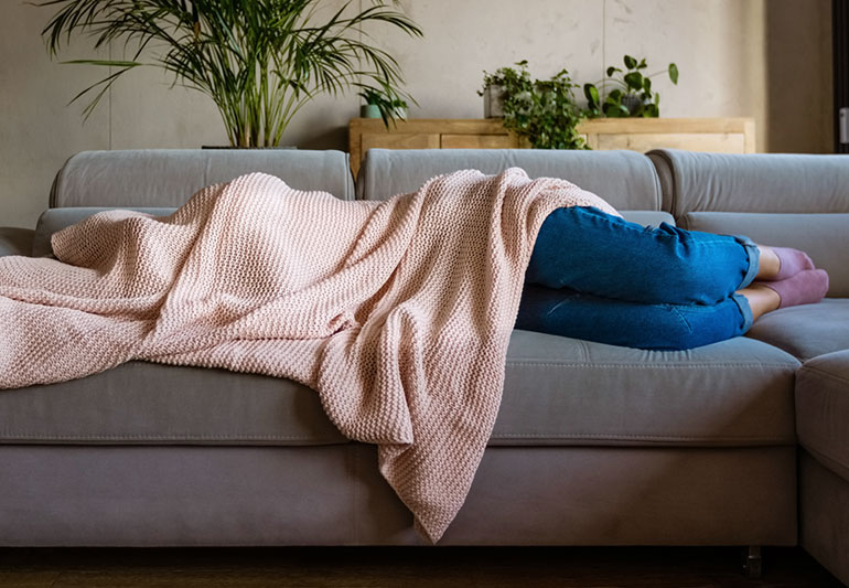 person Sleeping Under Blanket Migraine 1284882341 770x533 1