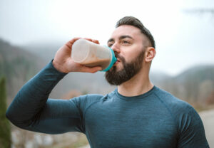 person drinks protein drink 1291853061 770x533 1